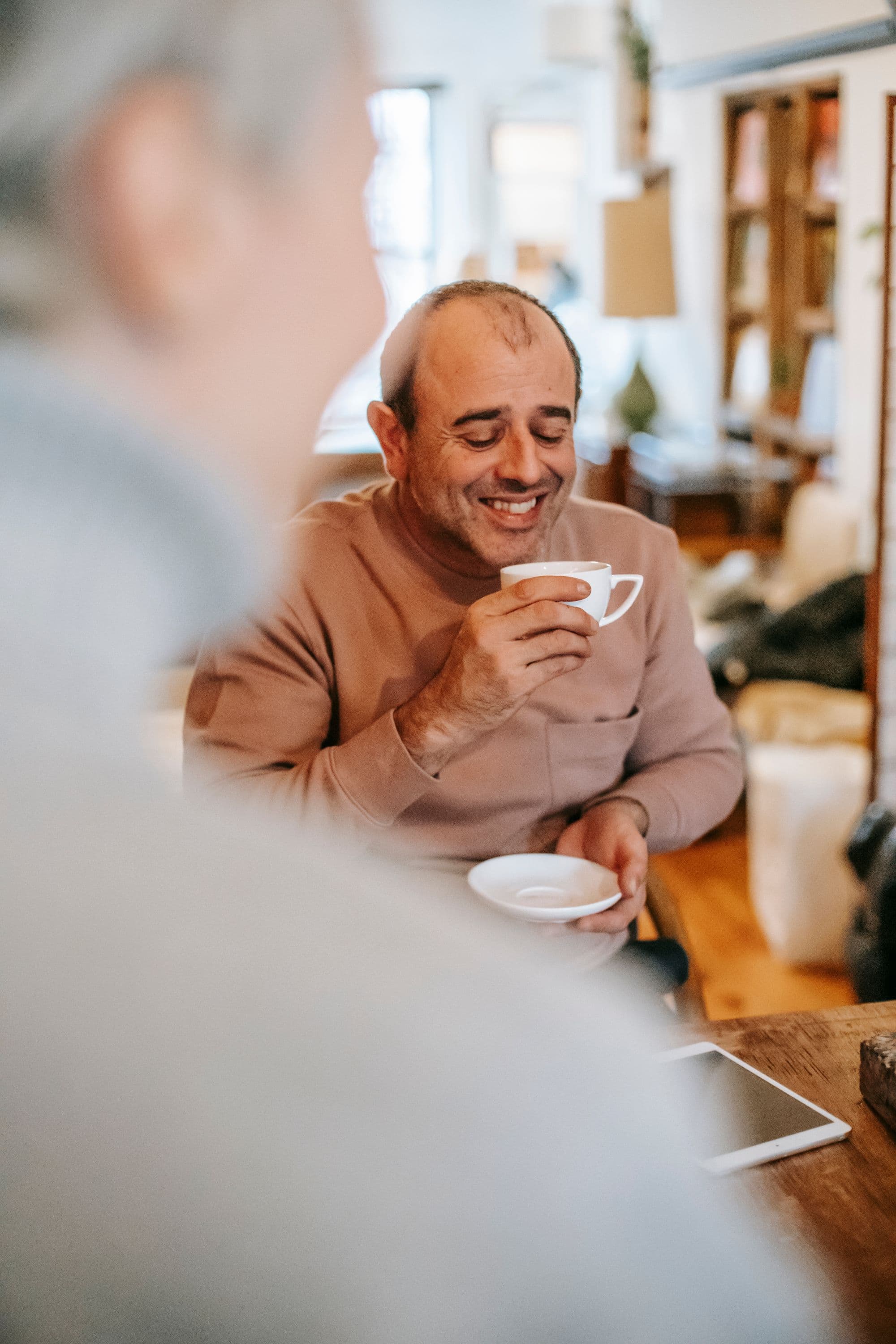 Man enjoying an unhurried morning coffee at home